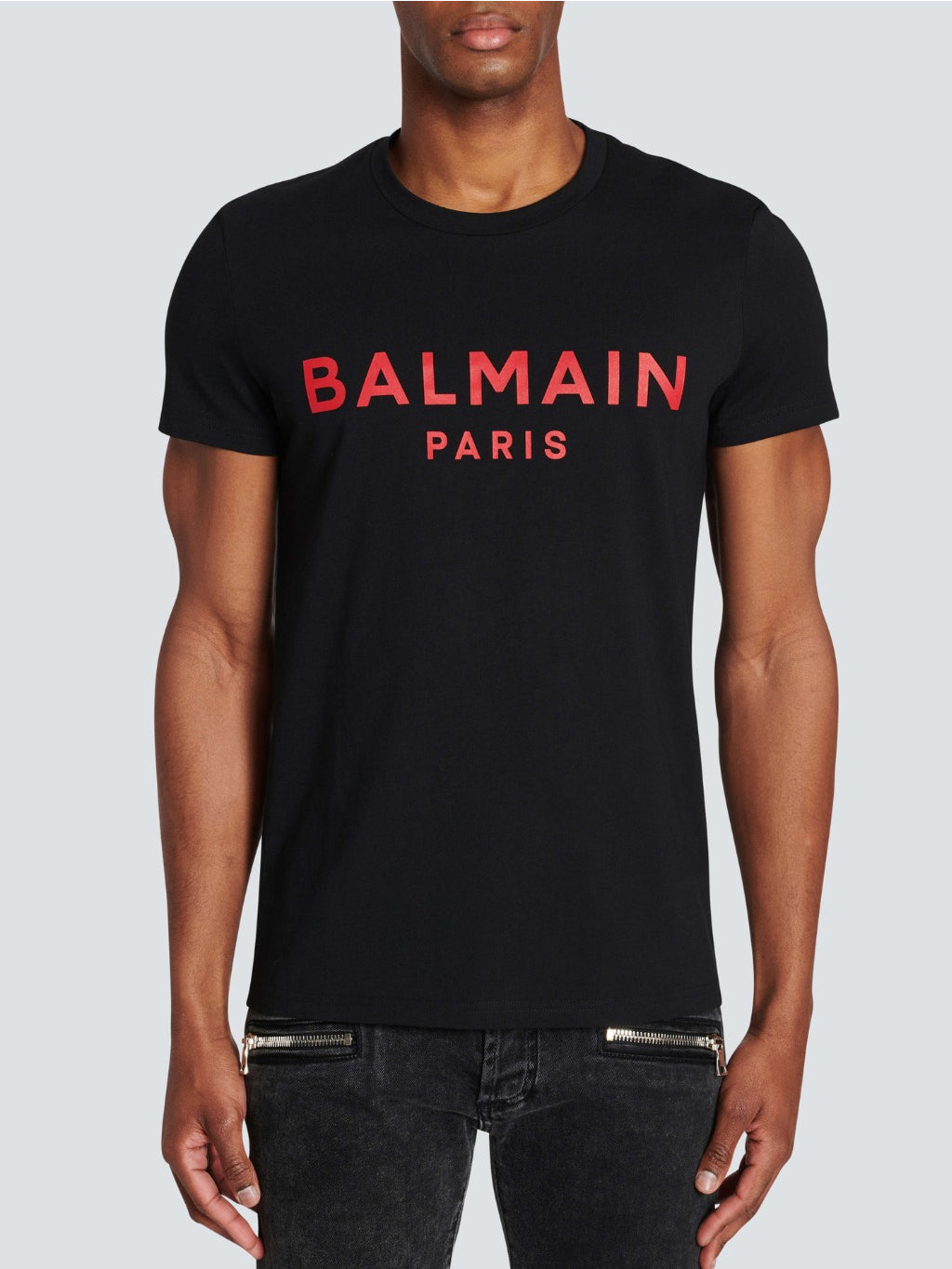 Brand printed in red featuring on Black t-shirt